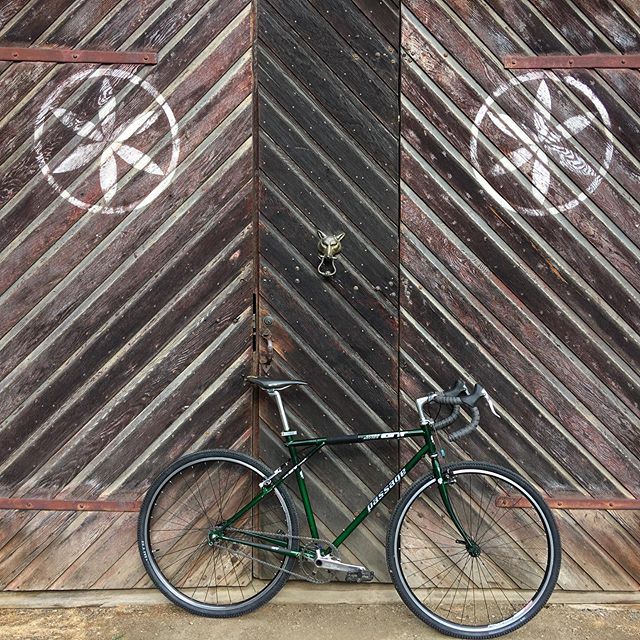 For my birthday ride this year I’m gonna race against the Cat A cyclocross geeks on this old as GT. I have no idea what I’m doing but I can pedal hard and build a sick bike out of shit lying around the shop. Mods on this one include magic gear (42-17) singlespeed conversion, ghetto tubeless running 37c WTB Riddlers, V-brake out back with a Problem Solvers Travel Agent, Tressostar tape to hold the full-length housing in place and provide a grip for off-bike antics. I’m sure I’ll get my “ass handed to me” as Vern would say but my kids will be there to heckle and spray water.